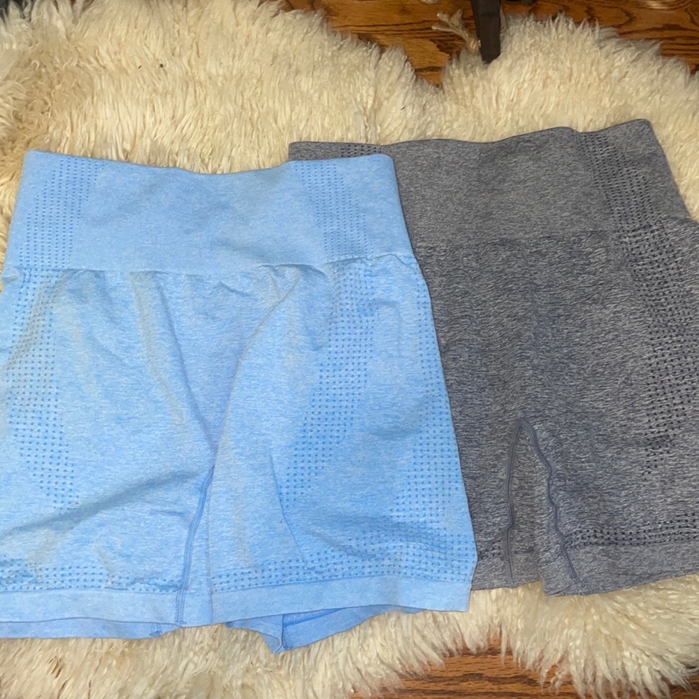 Baby blue & grey athletic shorts. Size large but run smaller